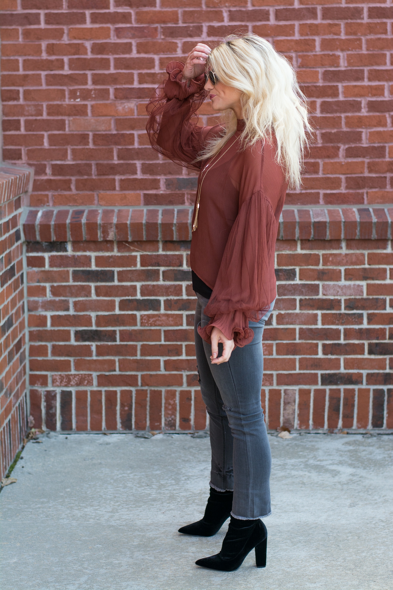 Casual Holiday Outfit: Rust Blouse + Gray Jeans. | Ashley from LSR