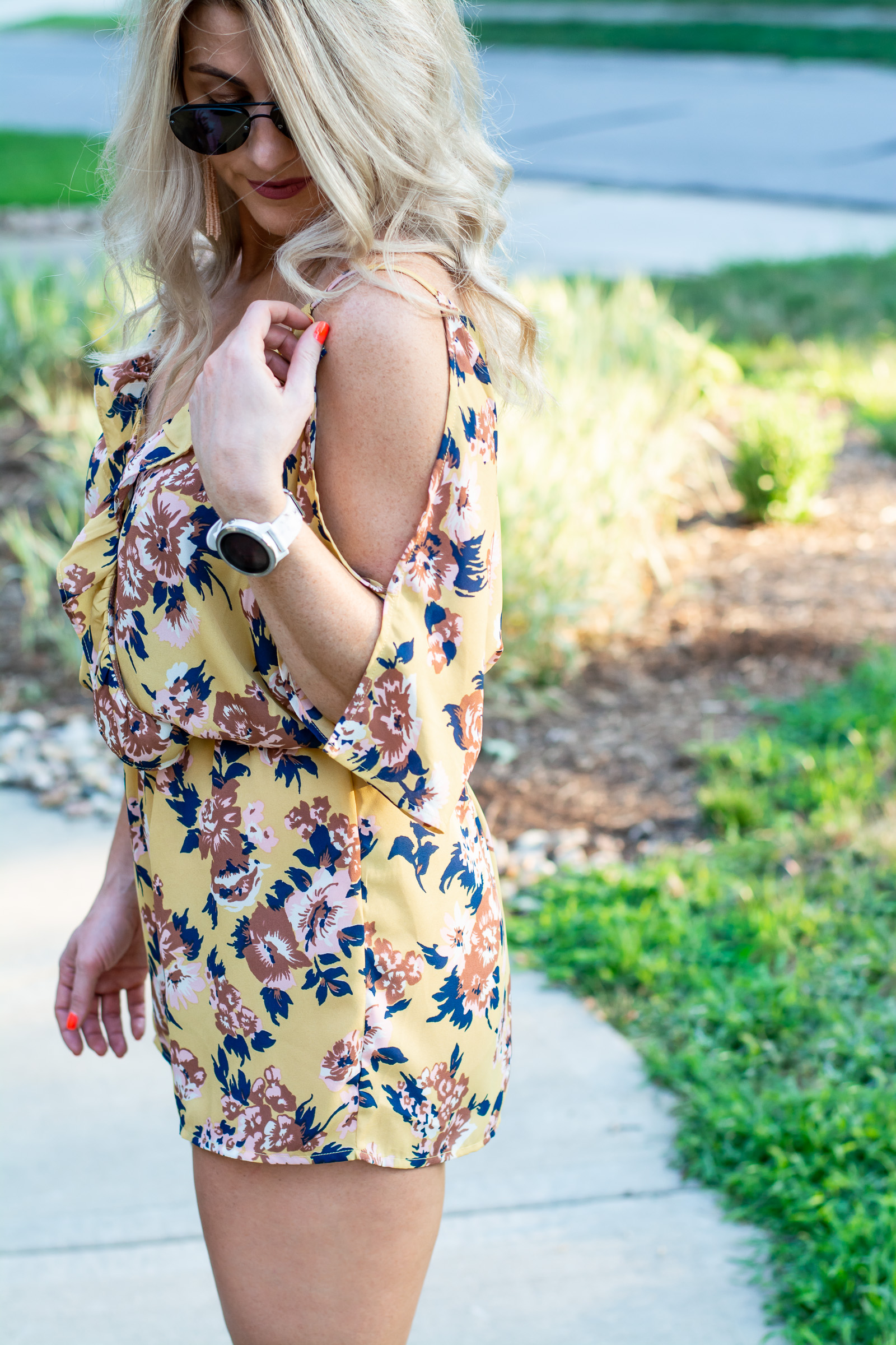 Outfit Idea: Summer Floral Romper Made Fall-Friendly with a Sweater. | LSR