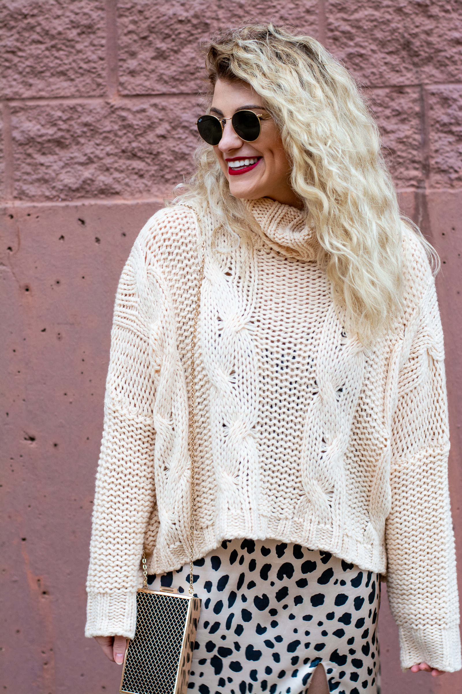 Holiday Chic: Cozy Sweater over a Leopard Dress. | LSR